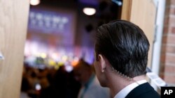 A secret service agent looks on as Republican presidential candidate Donald Trump speaks during a campaign rally, in Abingdon, Va., Aug. 10, 2016. 