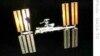 Space Freighter Docks At ISS