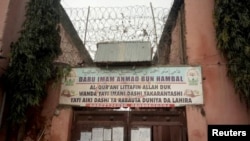 A sign is seen above a house where police rescued men and boys in Kaduna, Nigeria, September 27, 2019. The sign reads: 'Imam Ahmad Bun Hambal center for Islamic studies'. REUTERS/Stringer NO RESALES. NO ARCHIVES