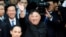 North Korean leader Kim Jong Un bids farewell to the crowd before boarding his train to depart for North Korea at Dong Dang railway station in Vietnam, March 2, 2019. 