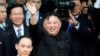 North Korean leader Kim Jong Un bids farewell to the crowd before boarding his train to depart for North Korea at Dong Dang railway station in Vietnam, March 2, 2019. 