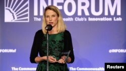 FILE - Yahoo CEO Marissa Mayer speaks at a Salesforce event at the Commonwealth Club in San Francisco, Oct. 30, 2014.