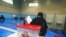 A Qatari woman cast her ballot in legislative elections, in Doha, Qatar, Oct. 2, 2021.