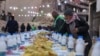 A table is prepared for iftar, the fast-breaking meal, on the first day of Ramadan in the Jobar neighborhood, which was devastated by the Syrian civil war, in Damascus, Syria, March 1, 2025.