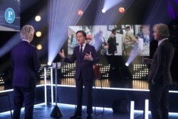 Dutch far-right politician Geert Wilders of the PVV party and Dutch Prime Minister Mark Rutte of the VVD Liberal party take part in a televised debate in Amsterdam, Netherlands, March 11, 2021.