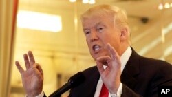 FILE - Republican presidential candidate Donald Trump answers questions during a news conference in New York, May 31, 2016.