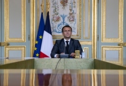 French President Emmanuel Macron attends a Climate Summit video conference, at the Elysee Palace, in Paris, France, April, 22, 2021.