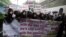 Muslim demonstrators hold banners during a protest in front of the U.S. embassy in Bangkok September 18, 2012. Demonstrators staged a peaceful protest against the anti-Islam film on Tuesday.