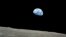 FILE - The distant blue Earth is seen above the Moon's limb, in this handout picture taken by the Apollo 8 crew forty-five years ago, on December 24, 1968, courtesy of NASA. 