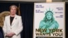 Pejabat Tenaga Kerja negara bagian New York, Roberta Reardon, berdiri di samping papan iklan selama konferensi pers untuk memperkenalkan inisiatif baru berjudul &quot;New York Wants You,&quot; sebuah program yang dirancang untuk merekrut dan mempekerjakan pekerja federal yang baru saja di-PHK di seluruh negara bagian New York. (Reuters)&nbsp;