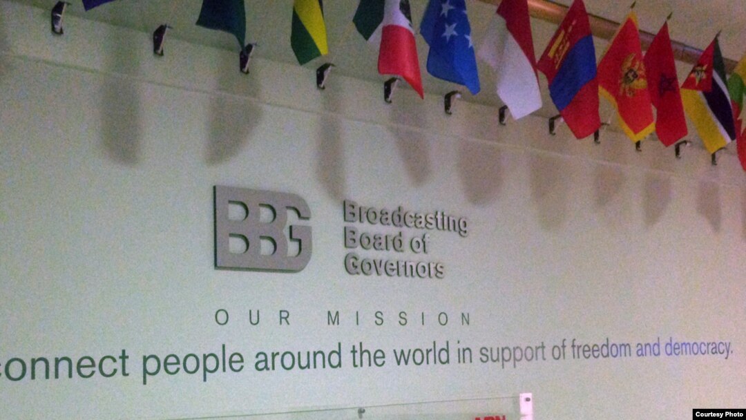 FILE - The logo of the Broadcasting Board of Governors, the U.S. government agency that oversees Voice of America and other congressionally-funded broadcast entities, is seen in the lobby of the Voice of America in Washington.