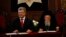 Ukraine's President Petro Poroshenko, left, and Ecumenical Patriarch Bartholomew I sign an agreement following their meeting at the patriarchate in Istanbul, Nov. 3, 2018.