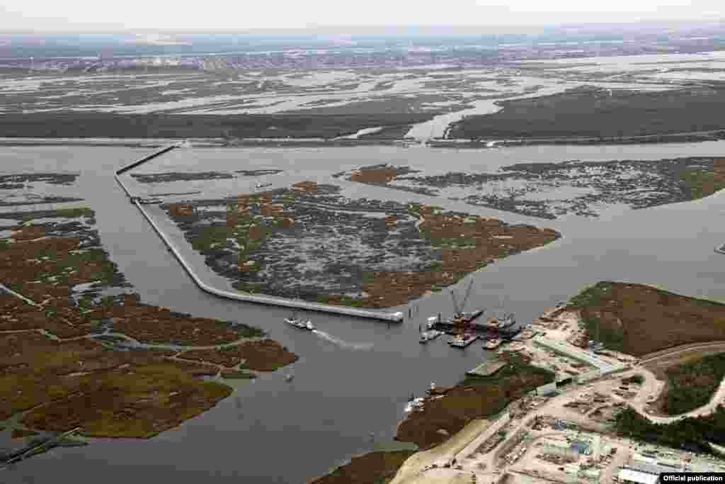 In this Dec. 15, 2010 aerial photo, the Inner Harbor Navigation Canal (IHNC) Surge Barrier, constructed after Hurricane Katrina to prevent tidal surges from hurricanes from reaching New Orleans, is shown in St. Bernard Parish, La. AP Photo/Gerald Herber