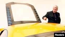 FILE - Designer Frank Stephenson attends the opening of the McLaren Brussels showroom, in Brussels, Belgium, Aug. 25, 2011. Stephenson has been picked by German company Lilium to help desing a lightweight aircraft powered by electric jet engines mounted on its wings.