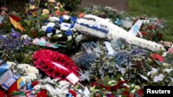 (File) Floral tributes left at the Memorial Garden in Dryfesdale Cemetery on the morning of the 30th anniversary of the bombing of Pan Am flight 103, December 21, 2018.