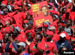 Supporters of Economic Freedom Fighters (EFF) party leader Julius Malema cheer at the party's final election rally ahead of the country's May 8 poll, in Johannesburg, South Africa, May 5, 2019.