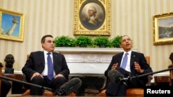 Presiden AS Barack Obama dan PM Tunisia Mehdi Jomaa dalam konferensi pers di Kantor Oval, Gedung Putih, Washington DC (4/4).