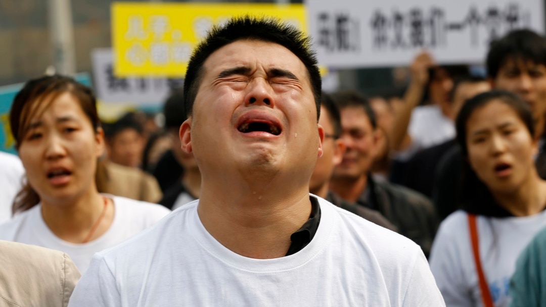 Chinese Families Vent Anger at Rally Outside Malaysian Embassy