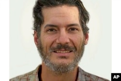 This 2023 age-progressed photo released by the FBI Washington Field Office shows what Austin Tice might look like in his 40s. Tice disappeared at a checkpoint in a contested area west of Damascus in 2012.