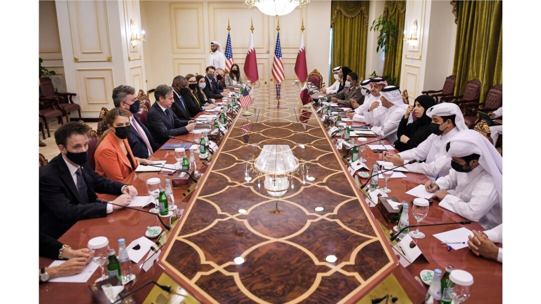 US Secretary of State Antony Blinken, fourth left and Secretary of Defense Lloyd Austin, fifth left, takes part in a meeting with Qatari counterparts in Doha, Qatar, Sept. 7, 2021.