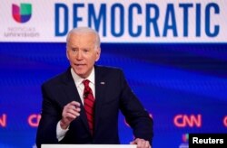 FILE - Democratic U.S. presidential candidate and former Vice President Joe Biden speaks during the 11th Democratic candidates debate of the 2020 U.S. presidential campaign, in Washington, March 15, 2020.