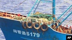 A handout picture released from Japan Coast Guard on 8 Sept. 2010 shows a Chinese fishing boat, which was seized by Japan Coast Guard's patrol boat near a disputed island a day before.