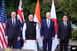 President Joe Biden, joined by Australia's Prime Minister Anthony Albanese, Japan's Prime Minister Fumio Kishida, and India's Prime Minister Narendra Modi, stand for a photo at the Quad leaders summit in Claymont, Del., Sept. 21, 2024.