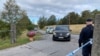 A motorcade carrying the North Korean delegation heads for Villa Elfvik, site of U.S. and North Korean nuclear negotiations, on the island of Lidingo, off Stockholm, Sweden, Oct. 5, 2019. 