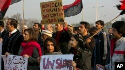 Pakistani civil society activists condemn the attack on Bacha Khan University, in Islamabad, Pakistan, Jan. 21, 2016.