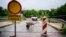 A bridge is closed, following a flood caused by heavy rains, in Hrasevo village, some 20 km northwest of capital Ljubljana, on August 4, 2023.