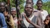 FILE - Opposition soldiers chant "Viva IO", meaning "long live the opposition", during a visit by a ceasefire monitoring team, at an opposition military camp near the town of Nimule in Eastern Equatoria state.