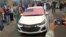 FILE - Employees watch as the last Chevrolet Cruze rolls off the assembly line at the General Motors Co assembly plant in Lordstown, Ohio, March 6, 2019, in this photo obtained from social media.