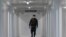 An Institutional Protection Service staffer walks during the inauguration of the new Panama Solidario hospital for seriously ill COVID-19 patients in Panama City, Panama, April 16, 2020.