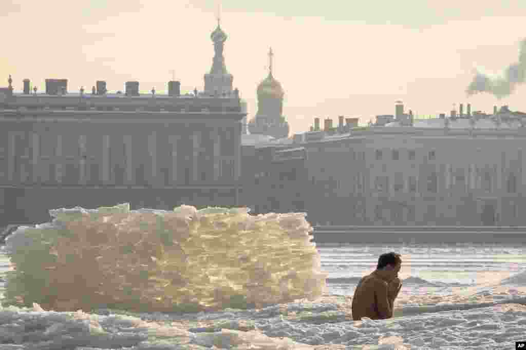 A man bathes in an ice hole in the Neva River St. Petersburg, Russia. The temperature in St. Petersburg is -15&#176; C ( 5&#176; F). 