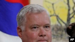 FILE - U.S. Special Representative for North Korea Stephen Biegun attends a meeting with South Korean Unification Minister Kim Yeon Chul at a government complex in downtown Seoul, South Korea, Aug. 21, 2019.