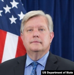 U.S. Ambassador to Somalia Richard Riley says an armed conflict between Somalia and Ethiopia is 