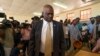 FILE - Botswana President Mokgweetsi Masisi arrives to vote in Botswana's general elections in Moshupa, Botswana. 