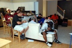 FILE -- Many fantasy football leagues hold draft parties, when league players get together to select their team’s players before the start of the season. (Photo by Flickr user David Clow via Creative Commons license)