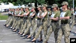 APTOPIX Ukraine Military Heels