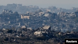 Buildings lie in ruin in the Gaza Strip, amid the ongoing conflict between Israel and Hamas, as seen from southern Israel, Jan. 2, 2025.