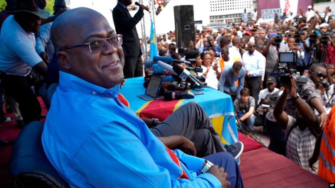 Opposition presidential candidate Felix Tshisekedi waits to address his supporters at the UDPS party headquarters in Kinshasa, Congo, Dec. 21, 2018.