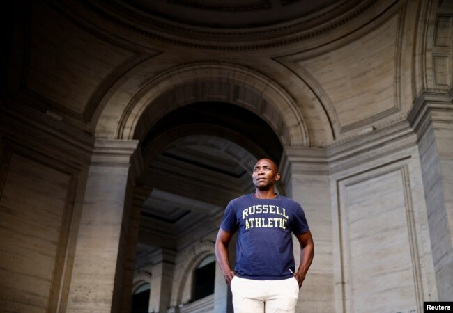 Italian-Ivorian activist, trade unionist and newly elected member of Parliament Aboubakar Soumahoro, looks on during an interview with Reuters, days before the possible swearing in of the government headed by leader of Brothers of Italy Giorgia Meloni in Rome, Italy on October 5, 2022. (REUTERS/Yara Nardi)