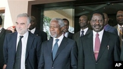 International Criminal Court Chief Prosecutor Luis Moreno Ocampo, left, former U.N. chief Kofi Annan, center, and Kenyan Prime Minister Raila Odinga, right, walk outside Crowne Plaza Hotel in Nairobi, Kenya, December 2, 2010