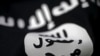 FILE - An Islamic State flag is seen in this undated photo illustration.