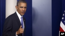 President Barack Obama walks out to make a statement to reporters in the Brady Press Briefing Room at the White House in Washington, Wednesday, Oct. 16, 2013. 