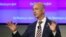 FILE - Amazon.com founder Jeff Bezos, who is also owner of The Washington Post, delivers remarks at the grand opening of the Post newsroom, Jan. 28, 2016. 