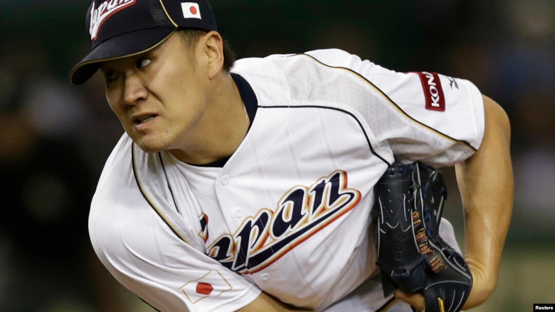 Pelempar bola Masahiro Tanaka dari Jepang dalam pertandingan lawan Belanda pada kompetisi World Baseball Classic (WBC) di Tokyo. (Foto: Dok)