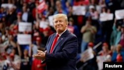 FILE - U.S. President Donald Trump attends a campaign rally at Rupp Arena in Lexington, Ky., Nov. 4, 2019. 