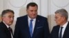 Newly elected members of Bosnia's tripartite inter-ethnic presidency, Croat member Zeljko Komsic, Serb member Milorad Dodik and Bosniak member Sefik Dzaferovic, attend the presidential inauguration ceremony in Sarajevo, Nov. 20, 2018.