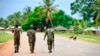 In this file photo taken on March 7, 2018, Soldiers from the Mozambican army patrol the streets after security in the area was increased, following a two-day attack from suspected Islamists in October last year.